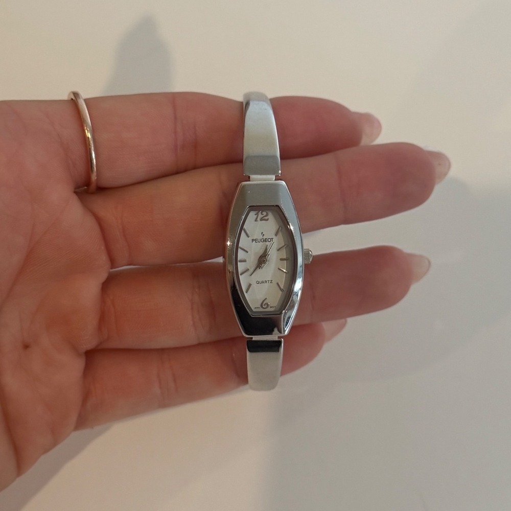 Peugeot Womens Silver Tone Bangle Watch Tonneau White Dial Quartz Timepiece